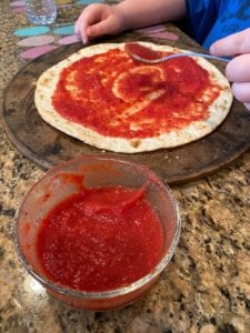 Two dollar quarantine pizza is affordable and fun for the entire family