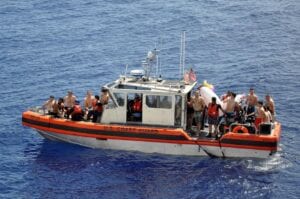 Watch as Coast Guard Shoots at 8-foot-long Shark Threatening Swim Party