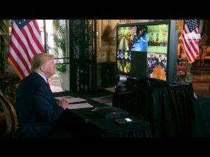 President trump participates in a video teleconference with members of the military