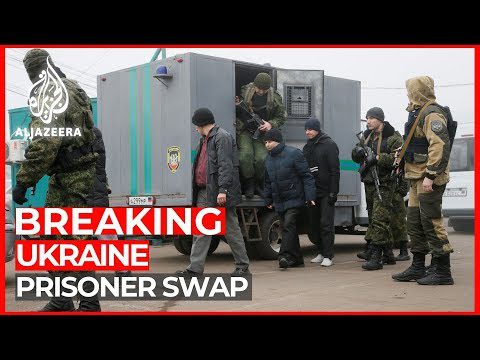 World News: Ukraine government and separatists begin prisoners swap