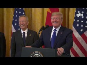President trump participates in a signing ceremony