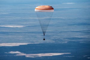 After 7 months in space, astronauts return to world filled with covid-19