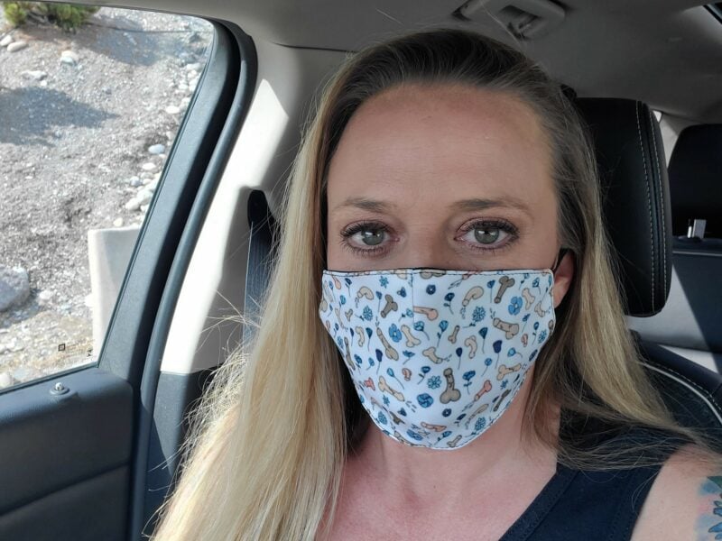 She's wearing a penis mask for safety and for charity