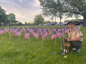 New jersey boy scout plays taps each night at veterans home where over 100 have died