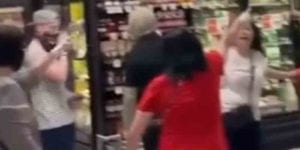 Watch as angry mob attacks woman at shop-rite not wearing face covering