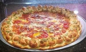 Pizza review: check out this pesto pepperoni pizza with a garlic knot crust