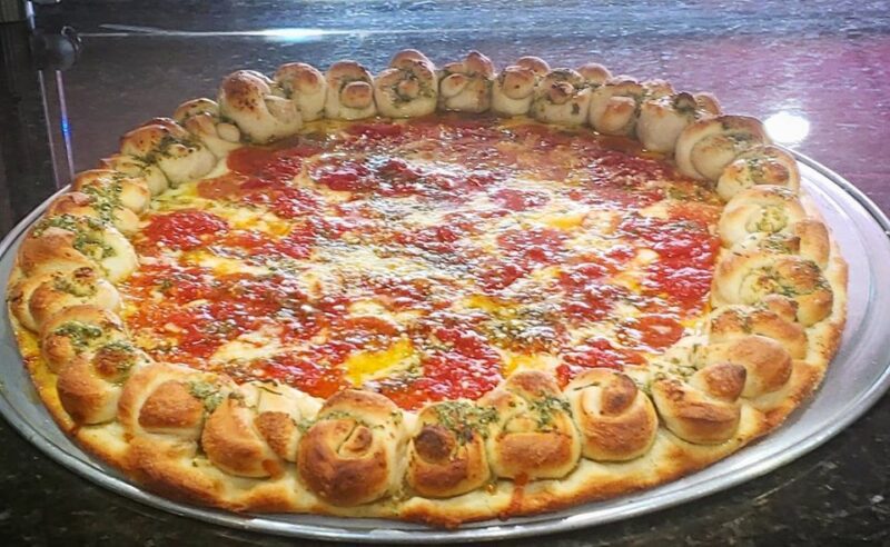 Pizza Review: Check Out This Pesto Pepperoni Pizza with a Garlic Knot Crust