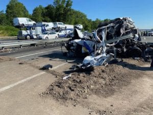 State police cruiser crushed by dump truck, officer, others suffer moderate injuries