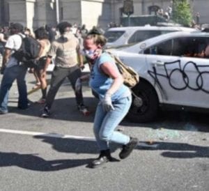 Woman charged for torching cop cars during philly riot