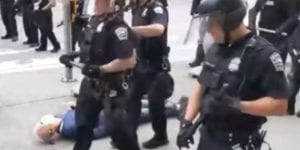 Two buffalo police officers suspended after assaulting elderly man