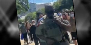 White protesters attack black cop for justice for george floyd?