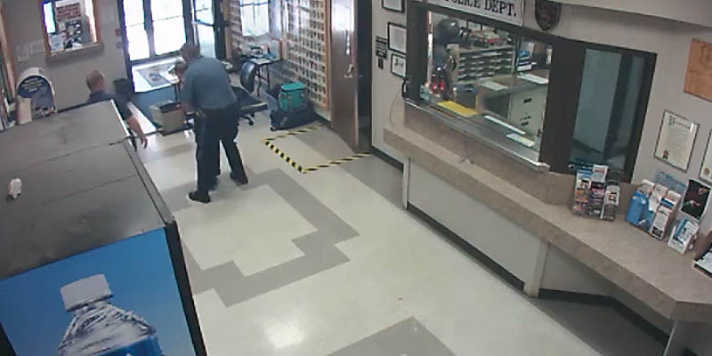 Officer Saves EMT Choking at Police Headquarters