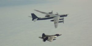 American f-22 raptors intercept russian bomber formations heading towards alaska