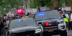 Police, protesters come together to protest police murder of george floyd