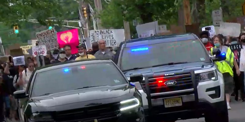 Police, Protesters Come Together to Protest Police Murder of George Floyd