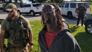 On first day of online school, teacher watches as man shoots and kills student's mother