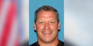 Former cop charged with forging document to get $425,000 loan