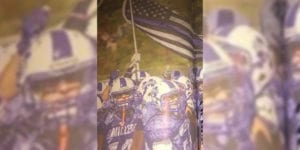 Yearbook picture of police flag is racist, claims new jersey high school principal