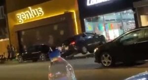 Watch: peaceful protester drives car through sneaker store on melrose avenue