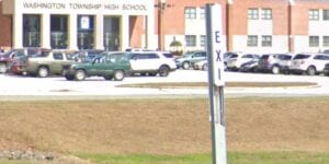 New jersey school district pauses classes, sports after 200 students show up for kick off party