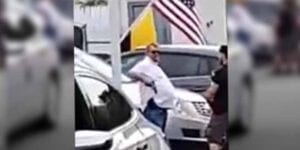 Man charged for pulling gun at wilmington political rally