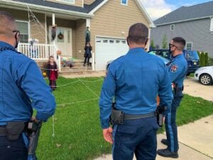 Lacey police make special visit to child whose parents have covid-19 on halloween