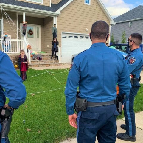 Lacey police make special visit to child whose parents have covid-19 on halloween - photo licensed by shore news network.