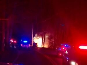 Howell police rescue driver from burning crash