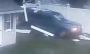Gloucester police searching for green dodge durango that drove through homeowner's vinyl fence, backyard