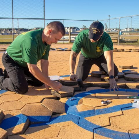 Escambia cadets chip in to repair damage from hurricane sally at nep ball park - photo licensed by shore news network.