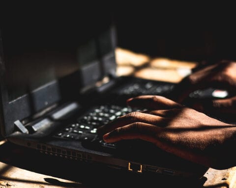 Using computer to commit a crime in darkness.