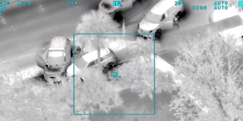 Watch: Murder suspect flees police on Thanksgiving, jumps in lake