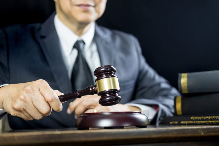 Prosecution of violent criminal street gang sends more than a dozen to prison, with others awaiting sentencing - photo licensed by shore news network.