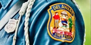 Woman shot while passenger in vehicle in newark, delaware