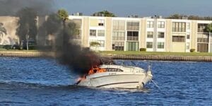 Man jumps from burning boat near palm city bridge