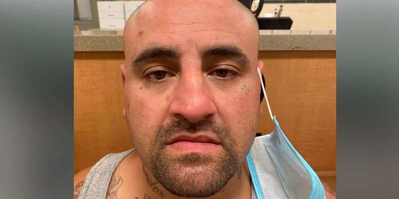 Lincoln Police Officer Helping Distressed Motorist Finds Outstanding Warrant, Guns