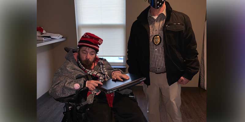 Cop working stolen laptop case for disabled vet helps him get a new one during the holidays