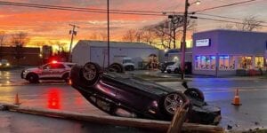 Driver escapes uninjured in neptune overturn, crash into utility pole