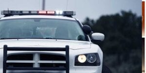 Police arrest suspicious man with gun, sleeping outside gas station