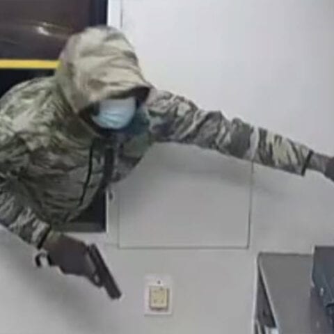 Watch: armed gunman robbed philadelphia checkers drive through window - photo licensed by shore news network.