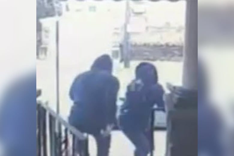 Watch: Masked gunmen wildly flail and shoot 20 times at man answering his front door in Philly