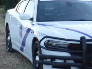 Arkansas state trooper injured scaling cemetery fence