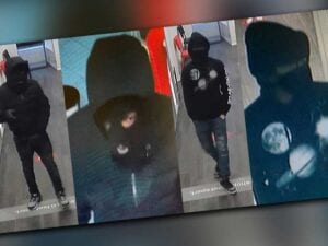 These d. C. Armed robbers forced a store employee into back room at gunpoint