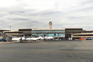 South korean charged with healthcare fraud as be boarded plan to leave u. S. At jfk airport