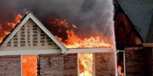Loves park public works employee saves woman from burning duplex