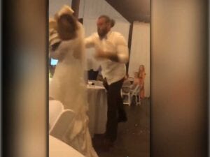 Red flag: manbun groom nearly knocks out bride with wedding cake right hook