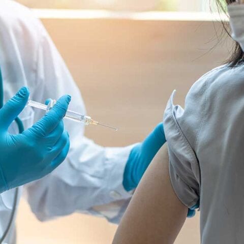 Third covid-19 shot has similar side effects to second jab, cdc reports - photo licensed by shore news network.