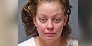Barricaded manchester mom charged after sending 3-year-old to daycare with lyft driver, neglecting urine covered infant