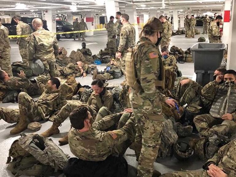 National guard in dc living like the homeless in parking garage after being kicked out of capitol complex - photo licensed by shore news network.