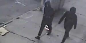 New york city police searching for two suspected of shooting man in leg